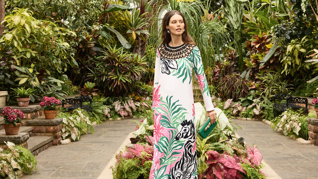 Model in long party dress with zebra print